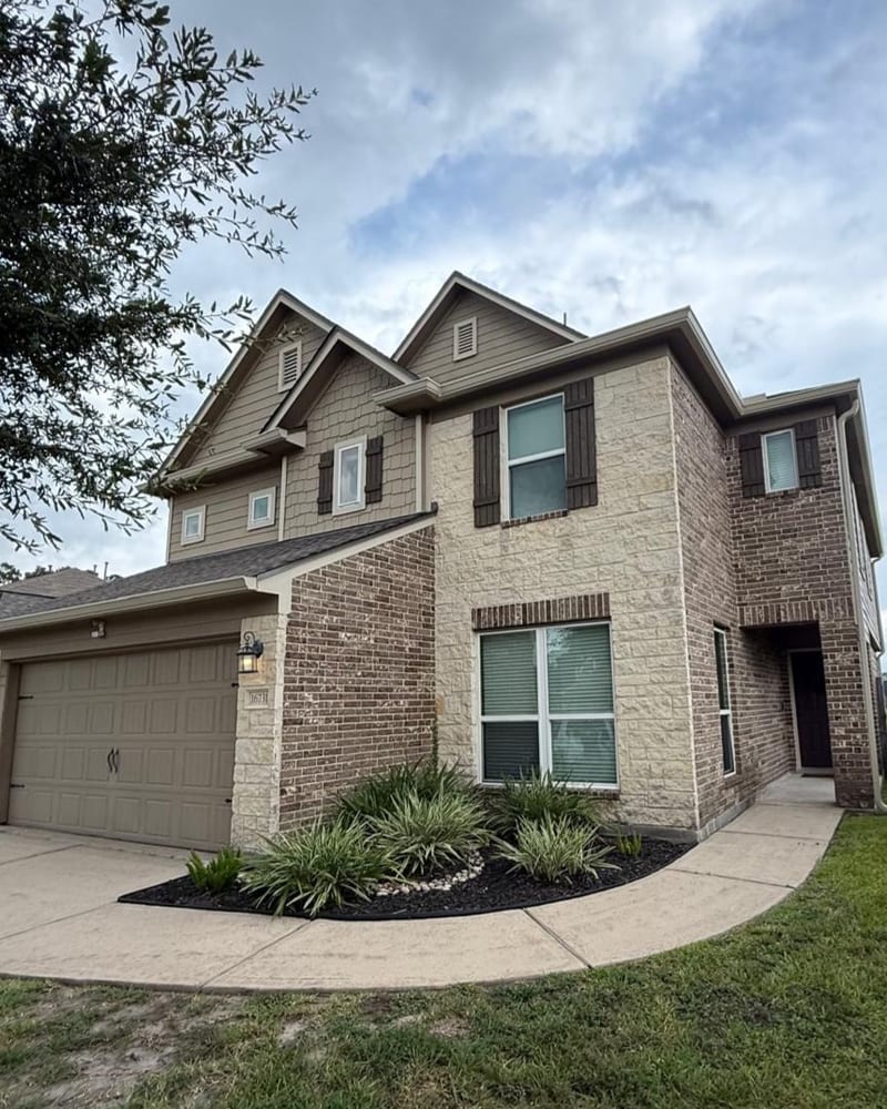 Modern home exterior with clean gutters